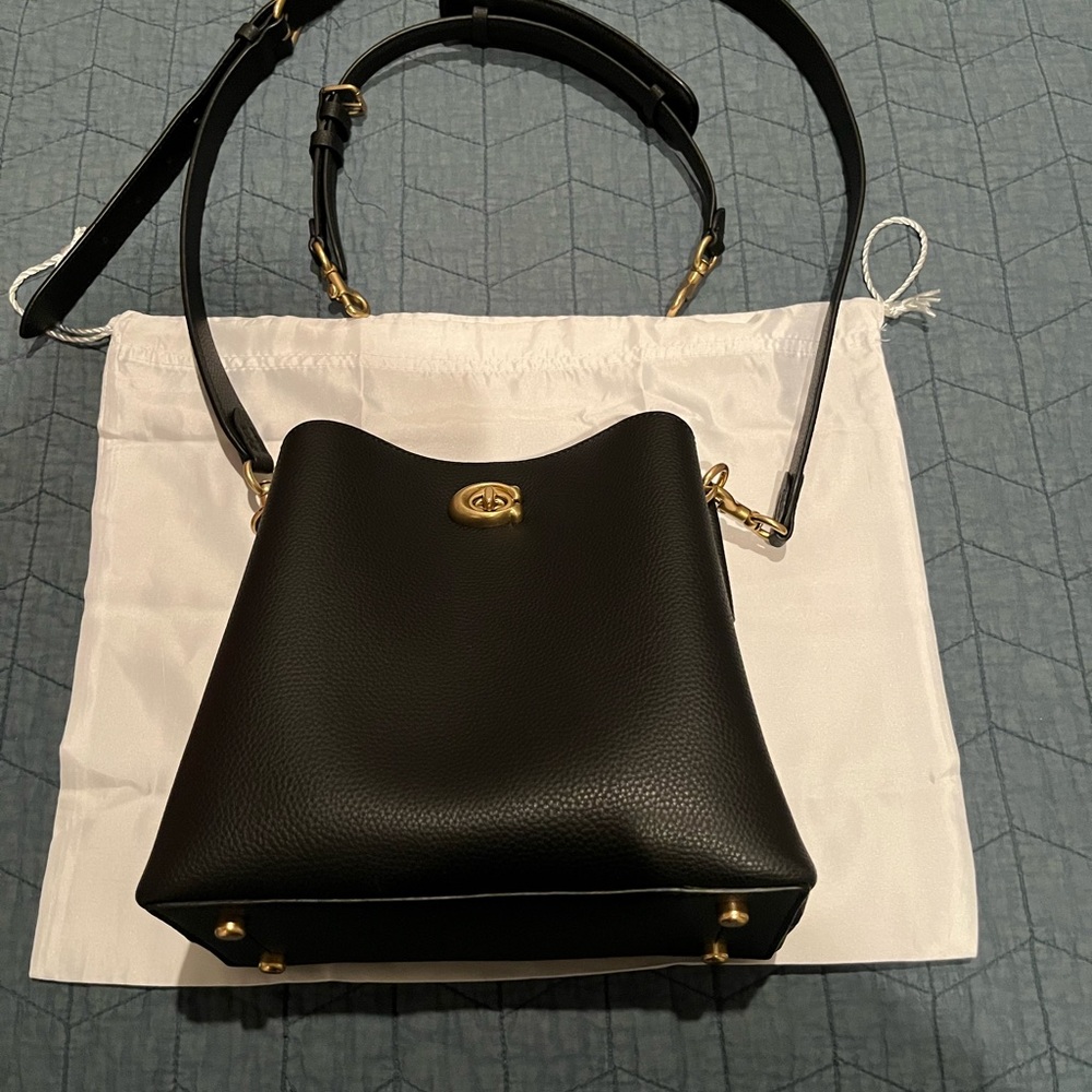 Gently used black Coach Crossbody Bucket Bag